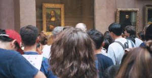 Mona Lisa with people crowding around